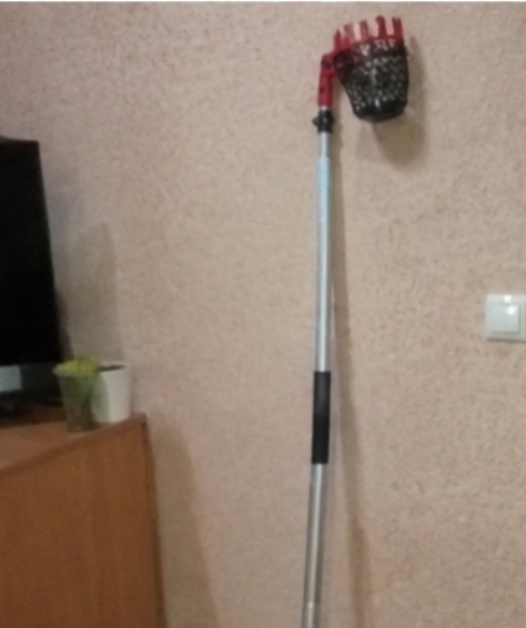 Плодозбирач у саду, фото покупця